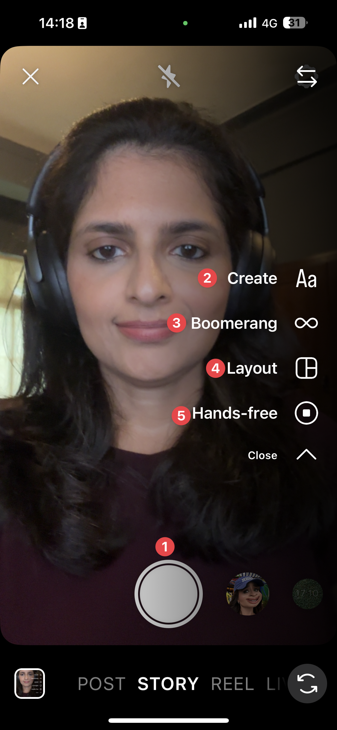 Instagram Story recording screen on a smartphone showing a woman with long dark hair wearing headphones, looking at the camera. Overlay icons on the right list different Story options: Create, Boomerang, Layout, and Hands-free